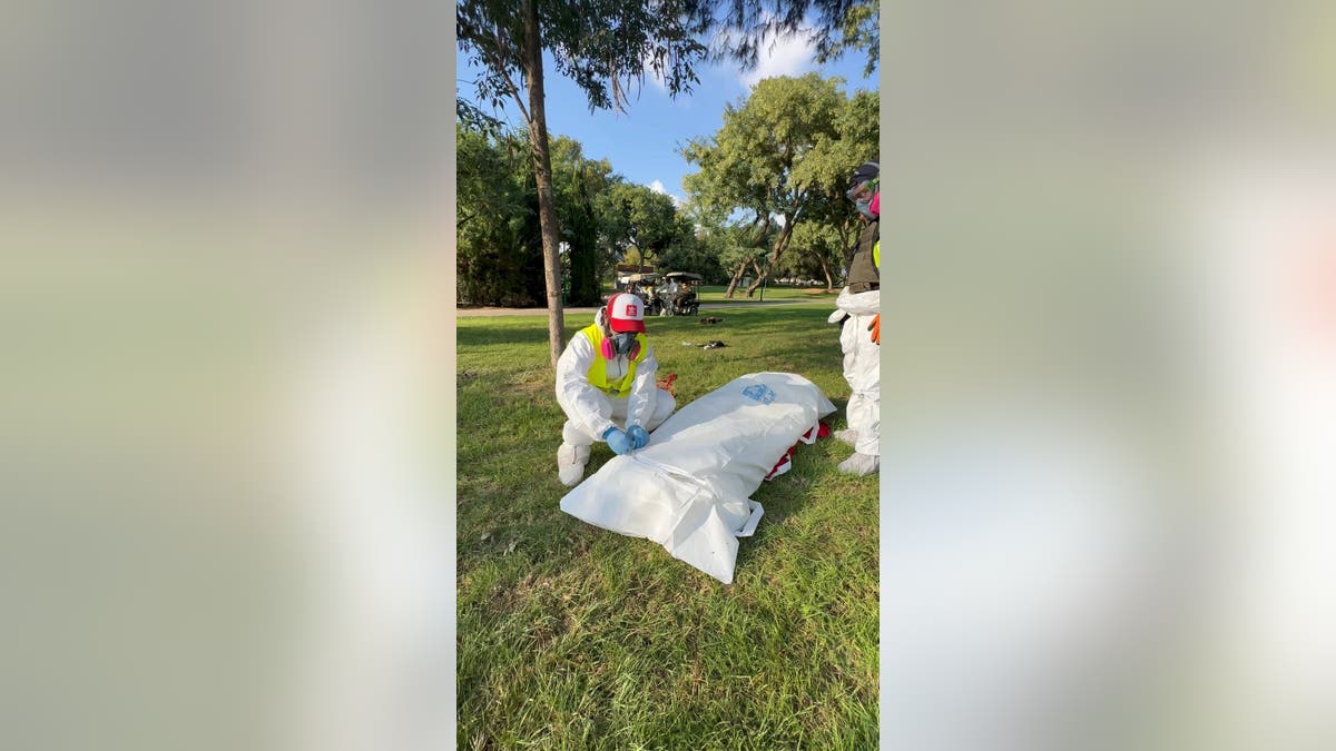 ZAKA volunteer near body bag