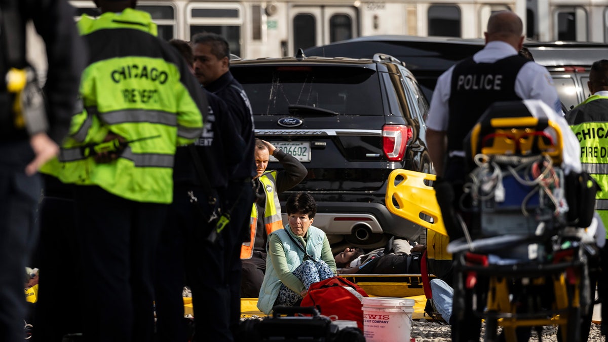 Injured woman sitting down