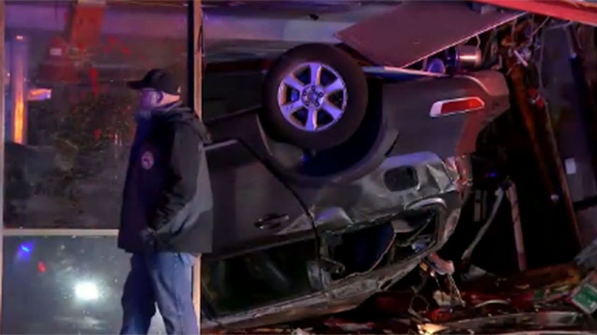 One of two cars lodged into former Boston Market