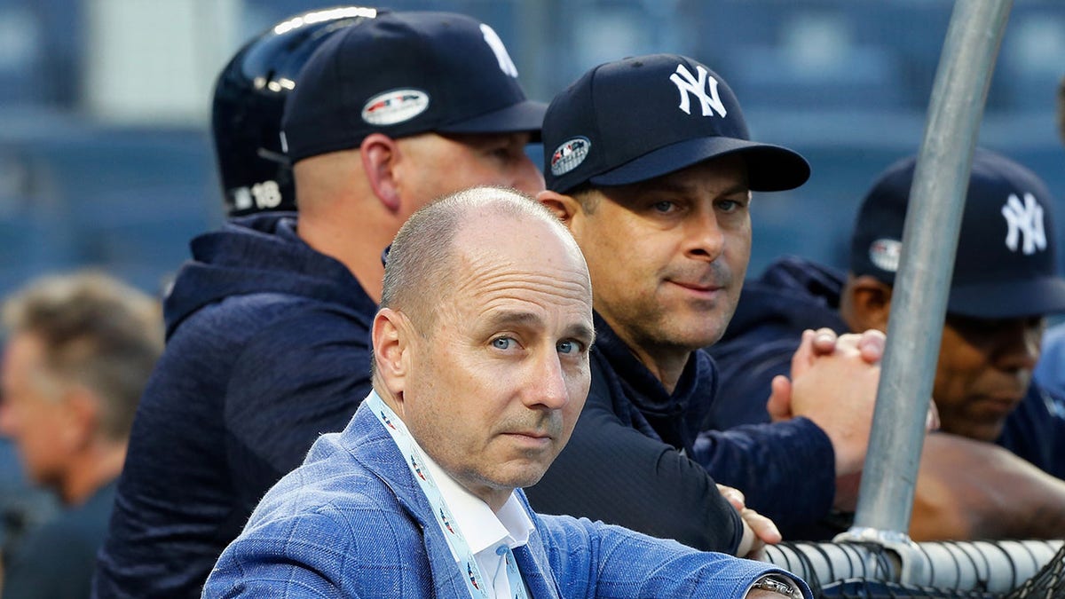 Brian Cashman and Aaron Boone