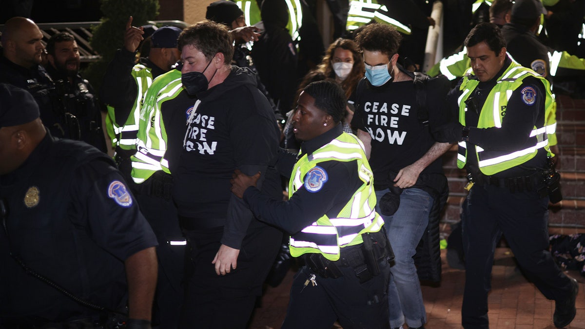 Officers arrest protesters