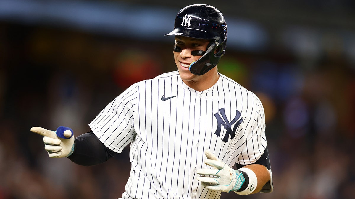 Aaron Judge points at dugout