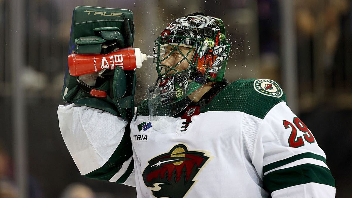 Marc-Andre Fleury sprays water