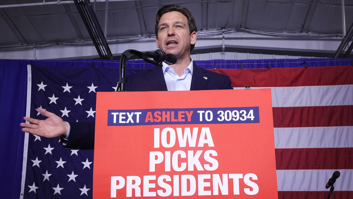 Republican presidential candidate Florida Governor Ron DeSantis speaks at podium in Iowa