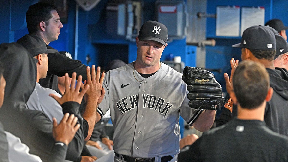 Gerrit Cole getting high fives