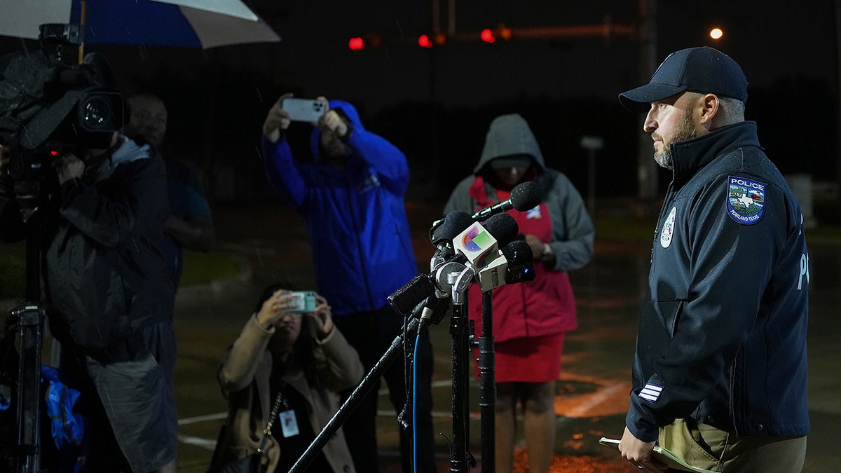 Pearland PD public information officer during newser