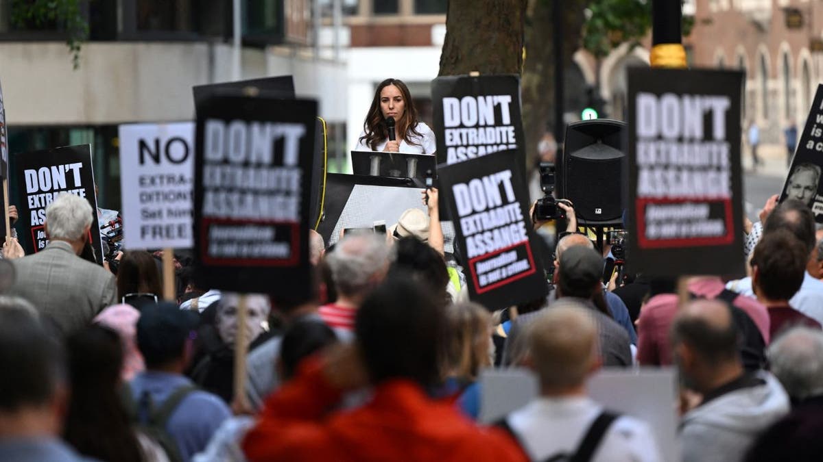 Julian Assange's wife speaks to a crowd