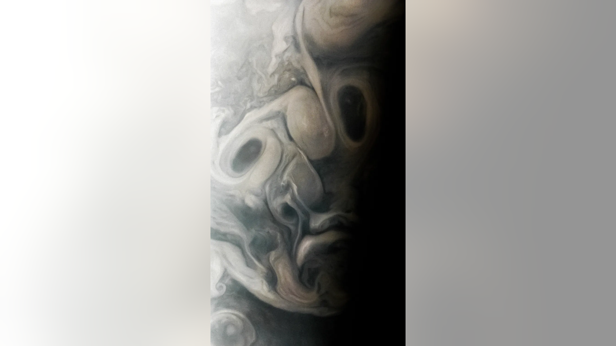 cloud formation on Jupiter resembling a face