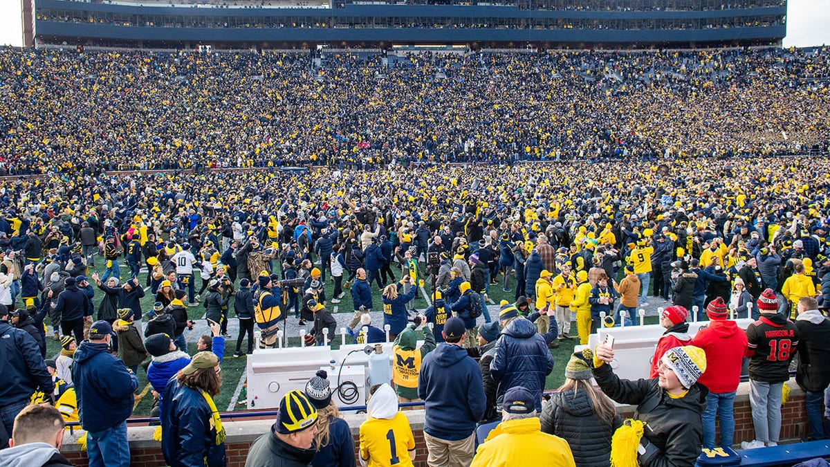 Michigan fans storm field