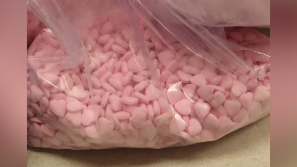 Pink heart-shaped pills