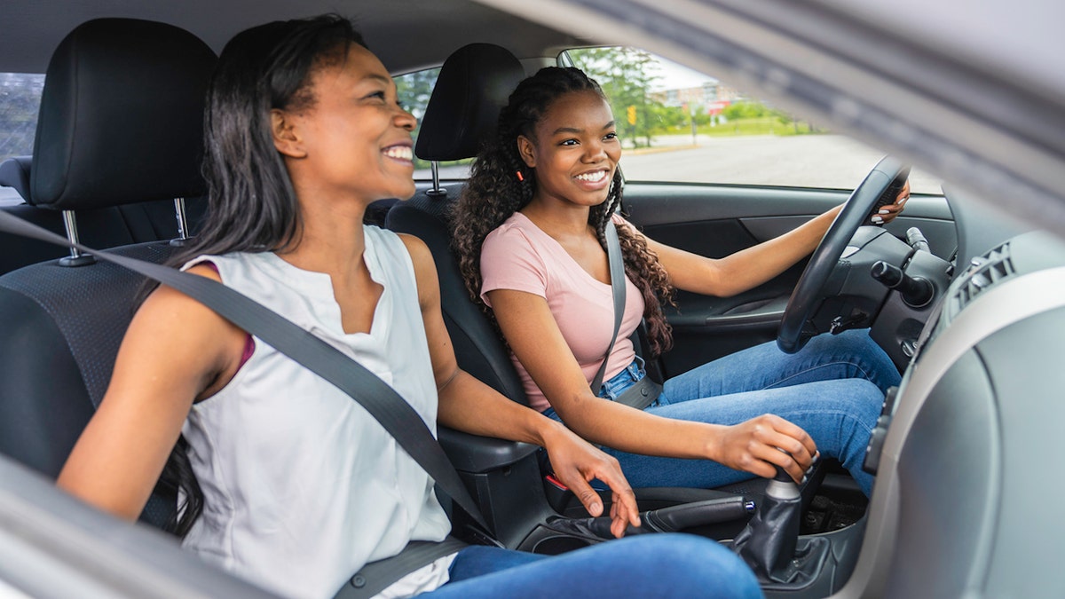 Teen driver with mother