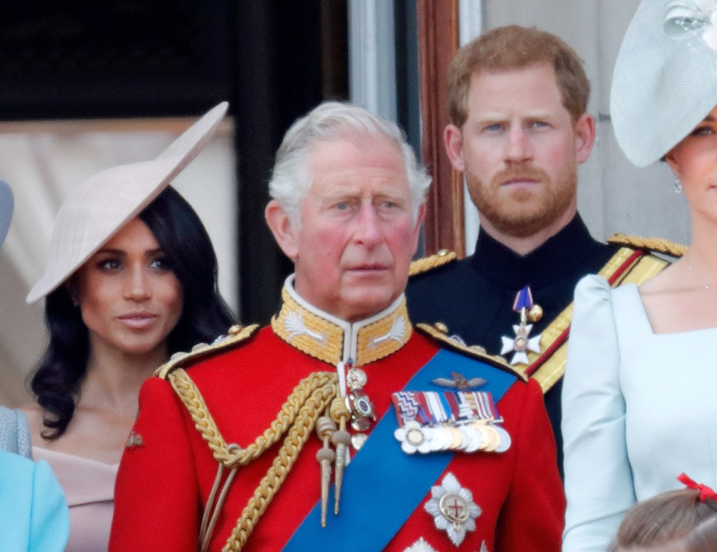 The trio are pictured together in 2018, prior to "Megxit."