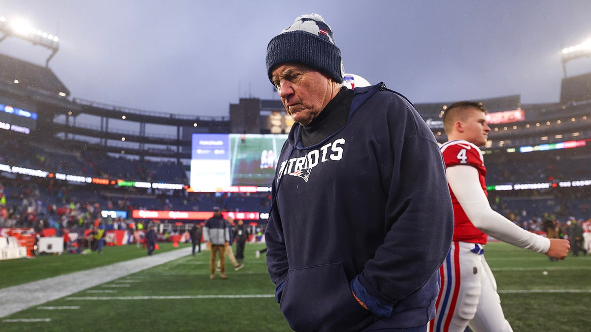 Bill Belichick walks off the field