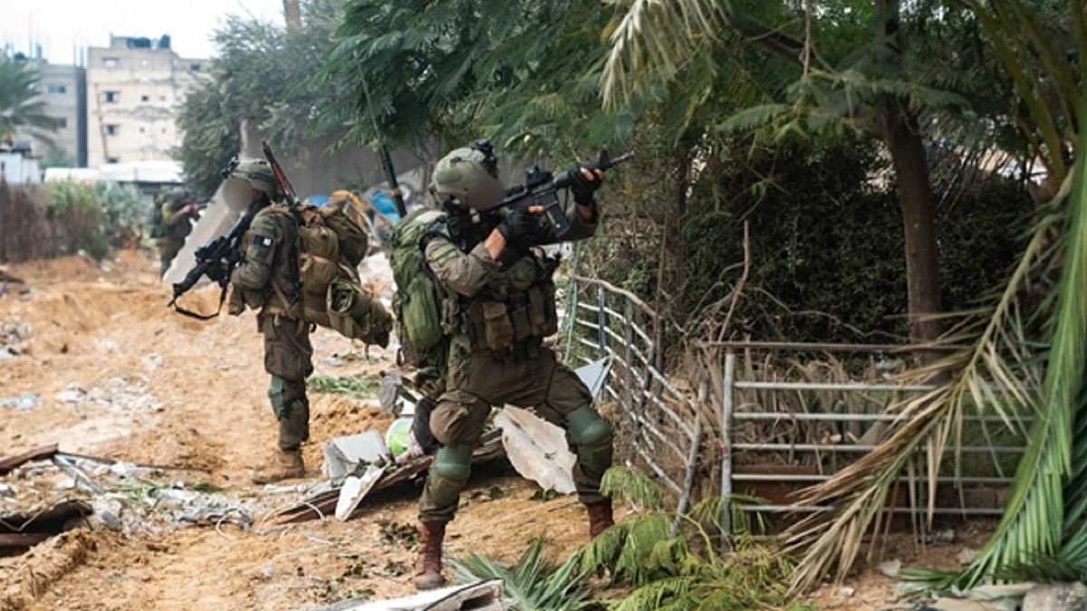 Israeli soldiers in combat in Gaza