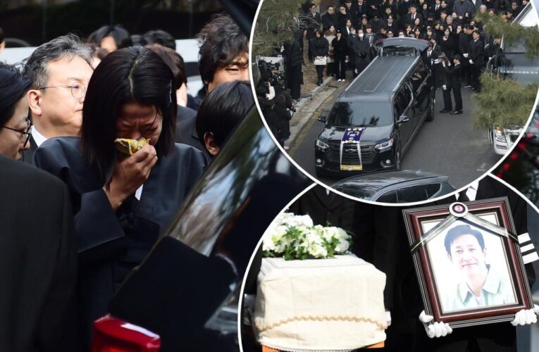 ‘Parasite’ star Lee Sun-kyun’s wife cries at private funeral