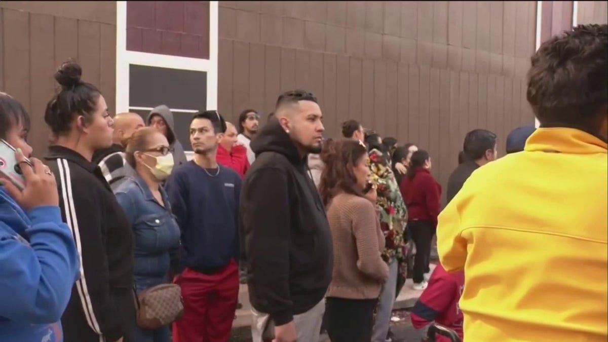 Group gathers near crime scene