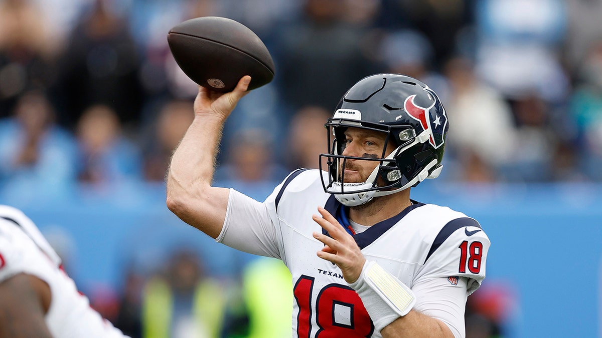 Case Keenum throws ball