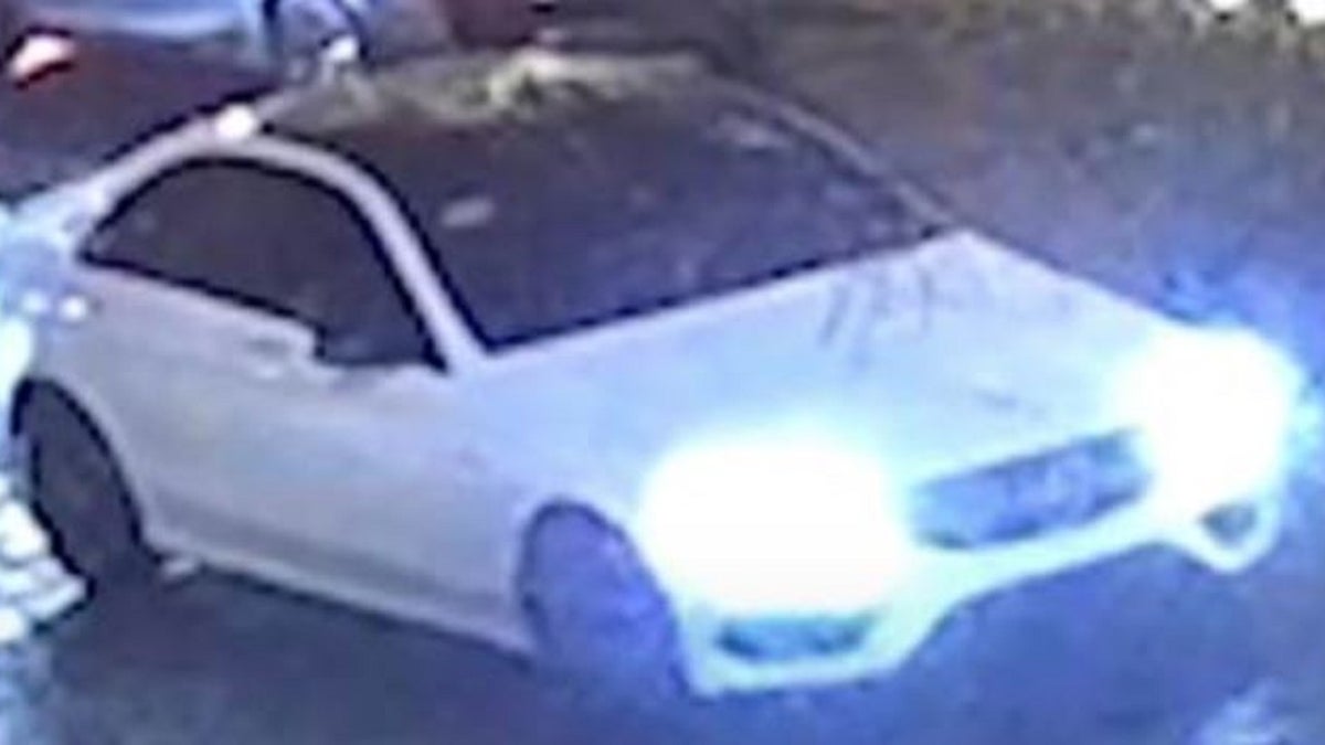 An image of a robbery suspect and a getaway vehicle being sought