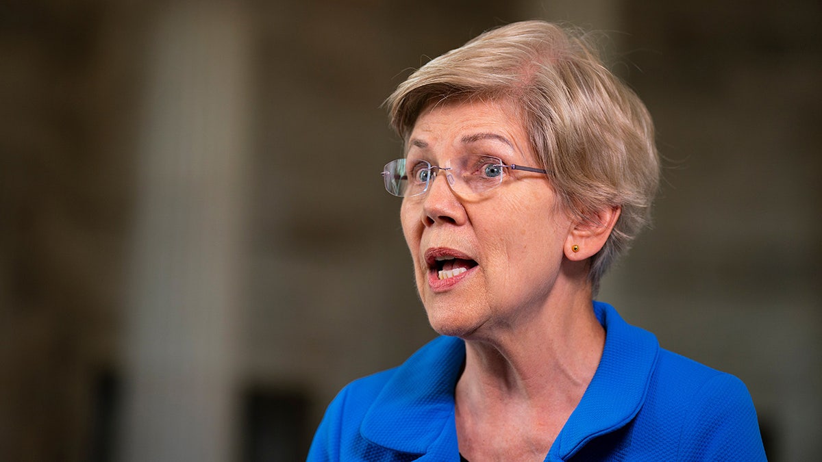 Sen. Elizabeth Warren gives an interview from inside the Capitol building