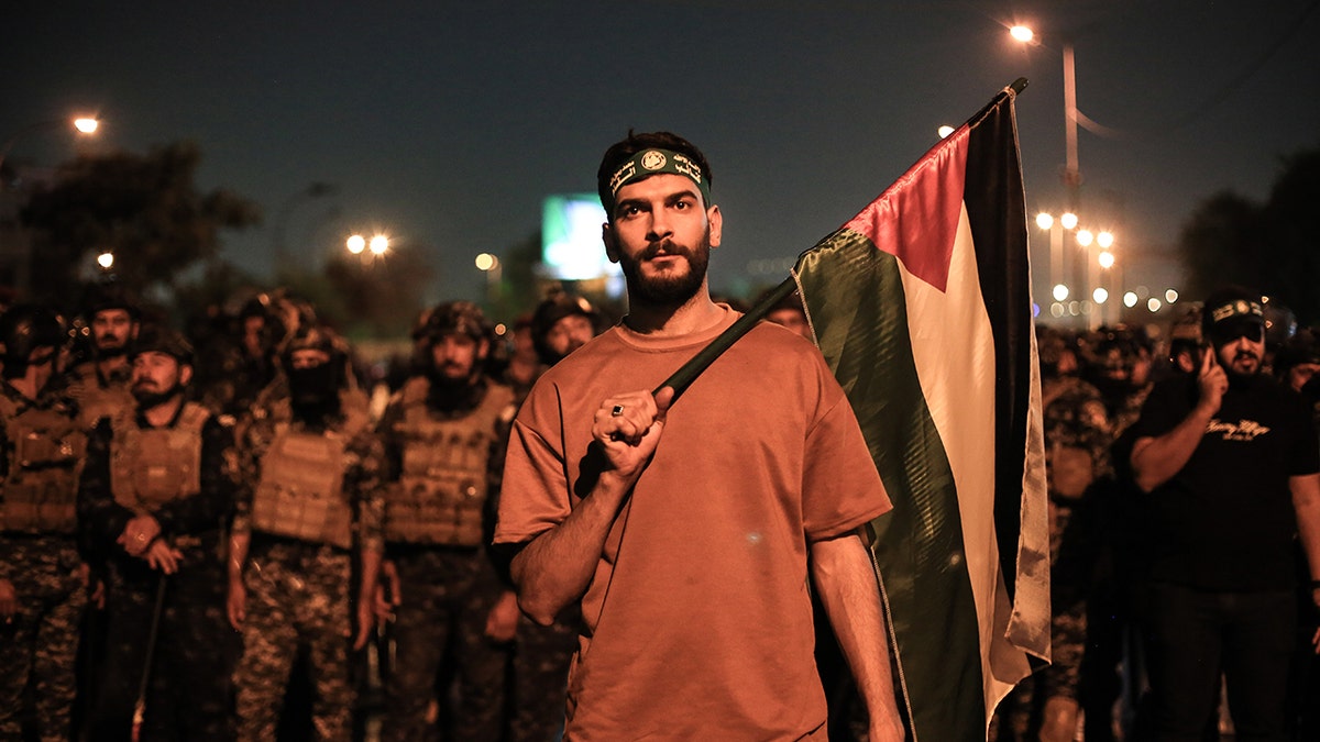 Palestinian protester outside the embassy