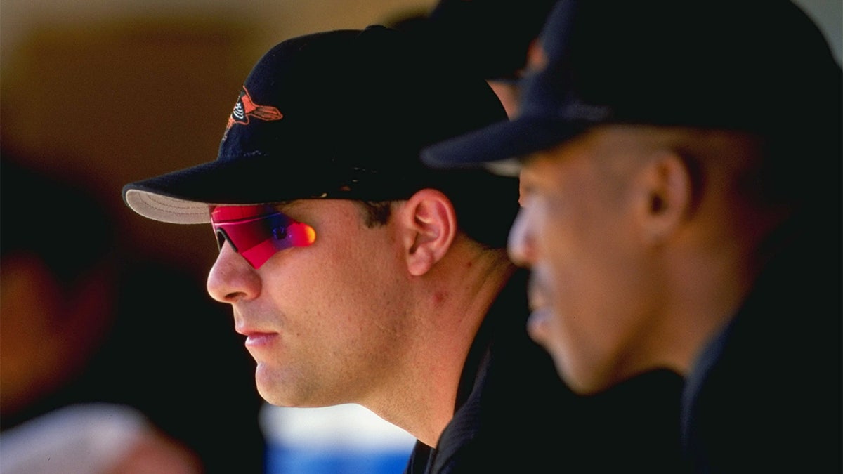 Ryan Minor looks on from the dugout