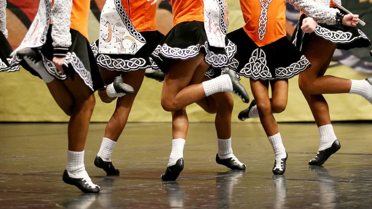 A leg shot of a group of Irish female dancers