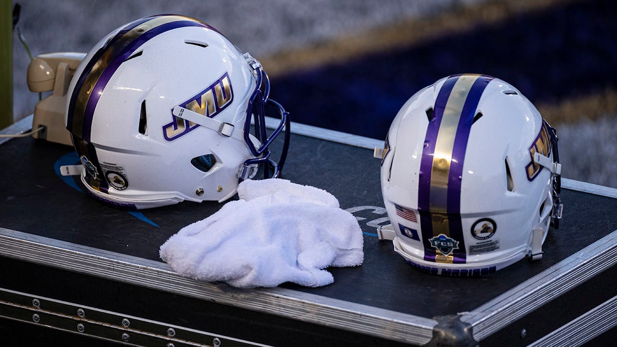 James Madison Dukes helmets on the sideline