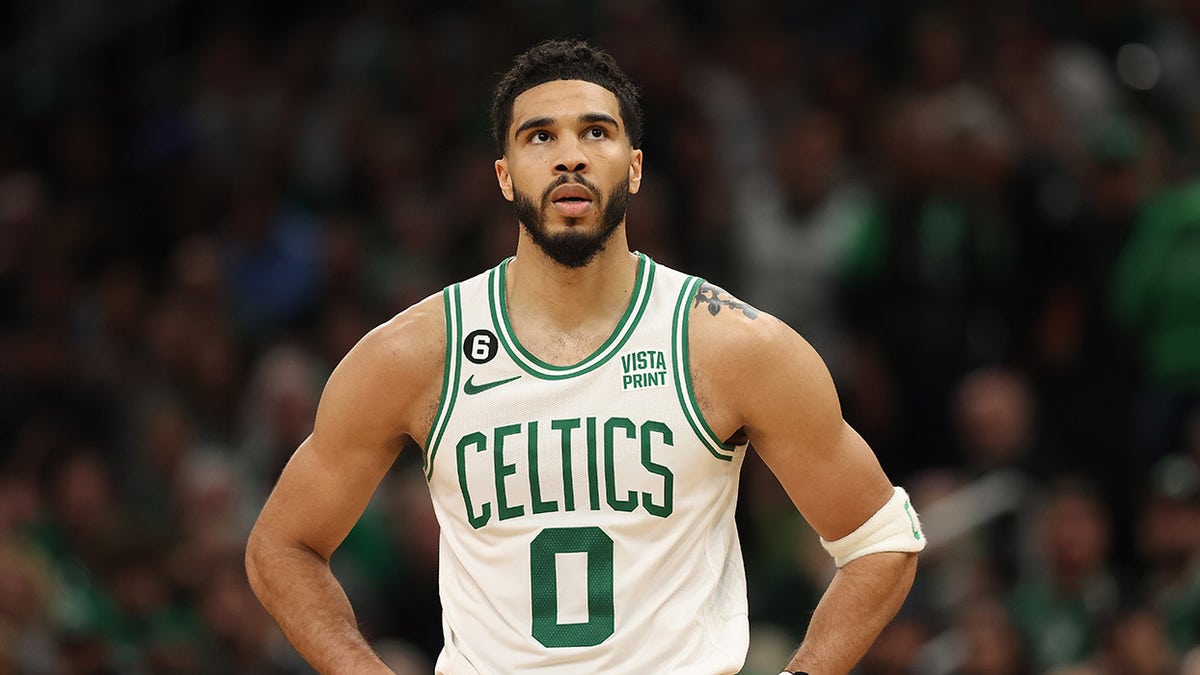 Jayson Tatum looks on court