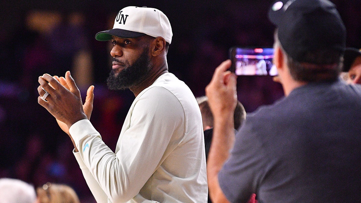 LeBron James watches Bronny