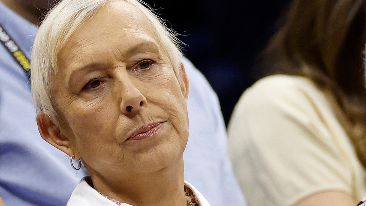 Martina Navratilova looks on