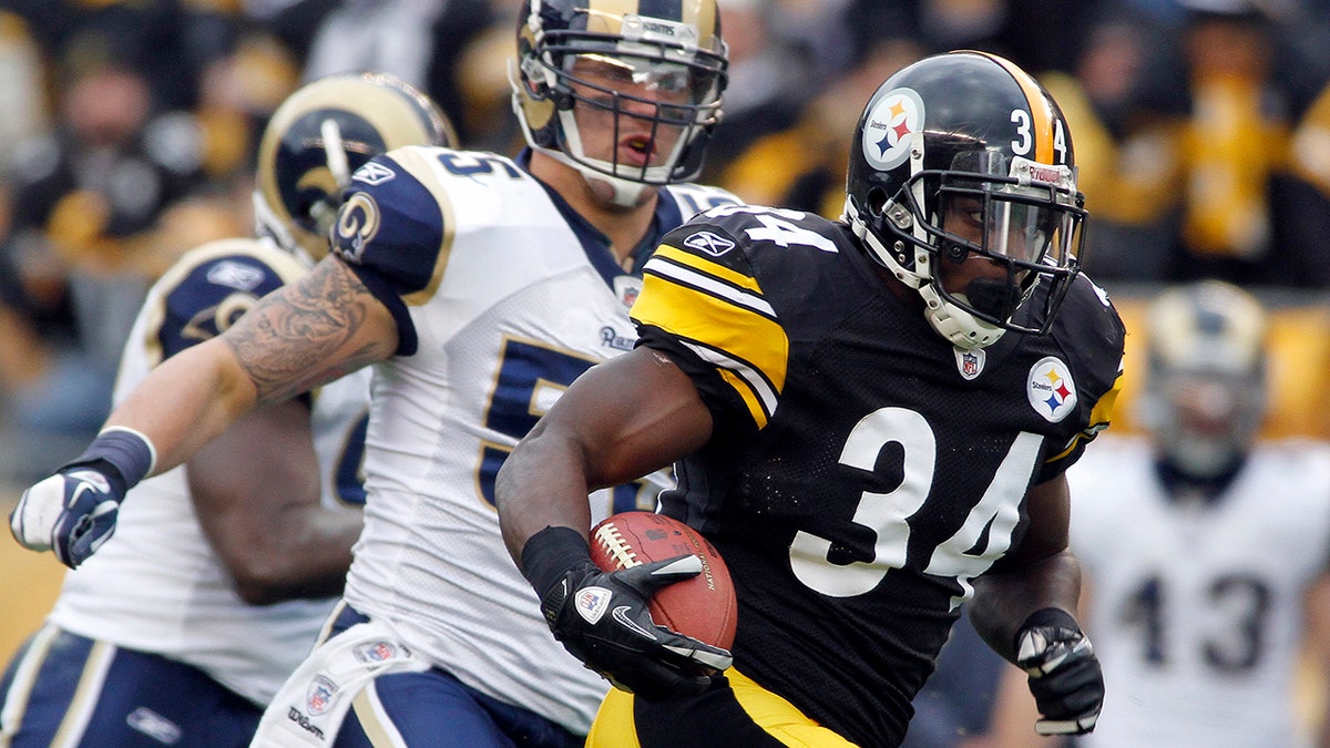 Rashard Mendenhall runs