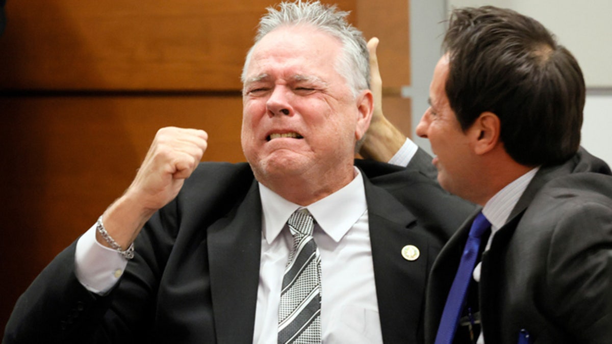 Former Marjory Stoneman Douglas High School School Resource Officer Scot Peterson reacts as he is found not guilty