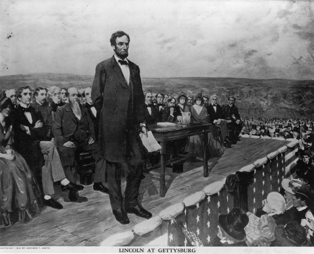 Abraham Lincoln, the 16th President of the United States of America, making his famous 'Gettysburg Address' speech at the dedication of the Gettysburg National Cemetery during the American Civil War.