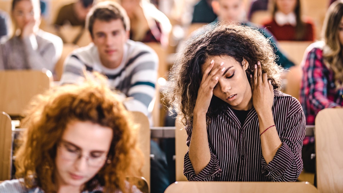 Female college student overwhelmed