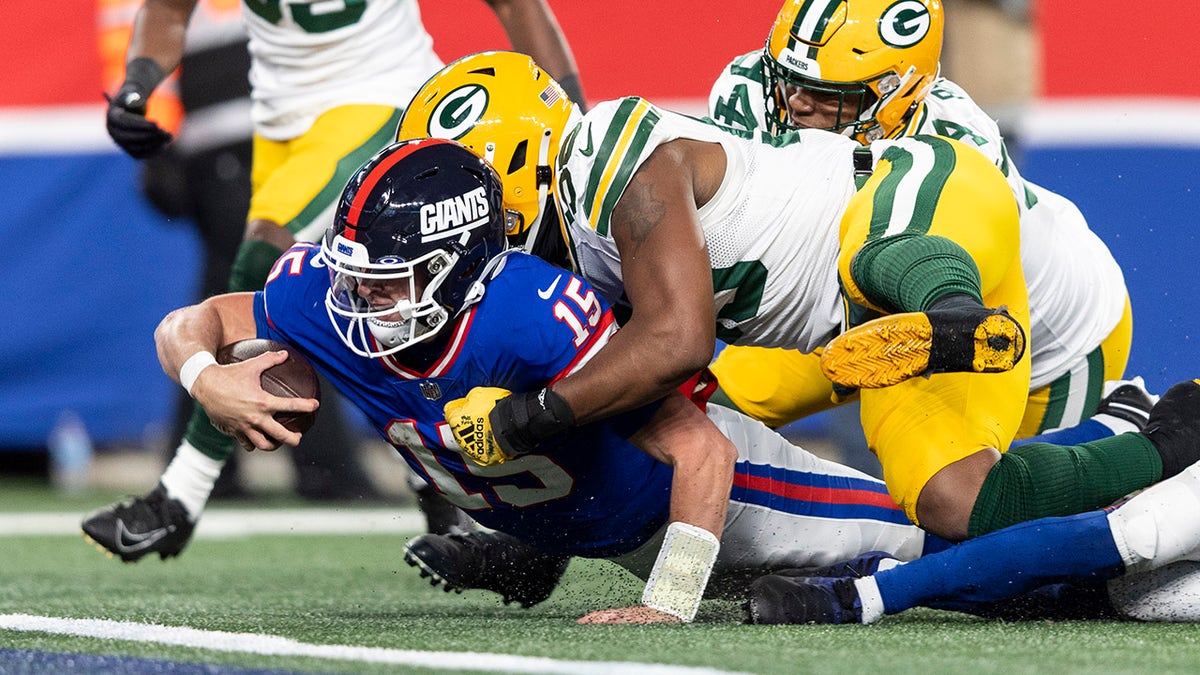 Tommy DeVito dives for yardage