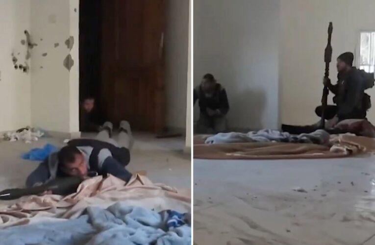 Moment Hamas terrorist crawl on floor to fire at Israeli soldiers before airstrike