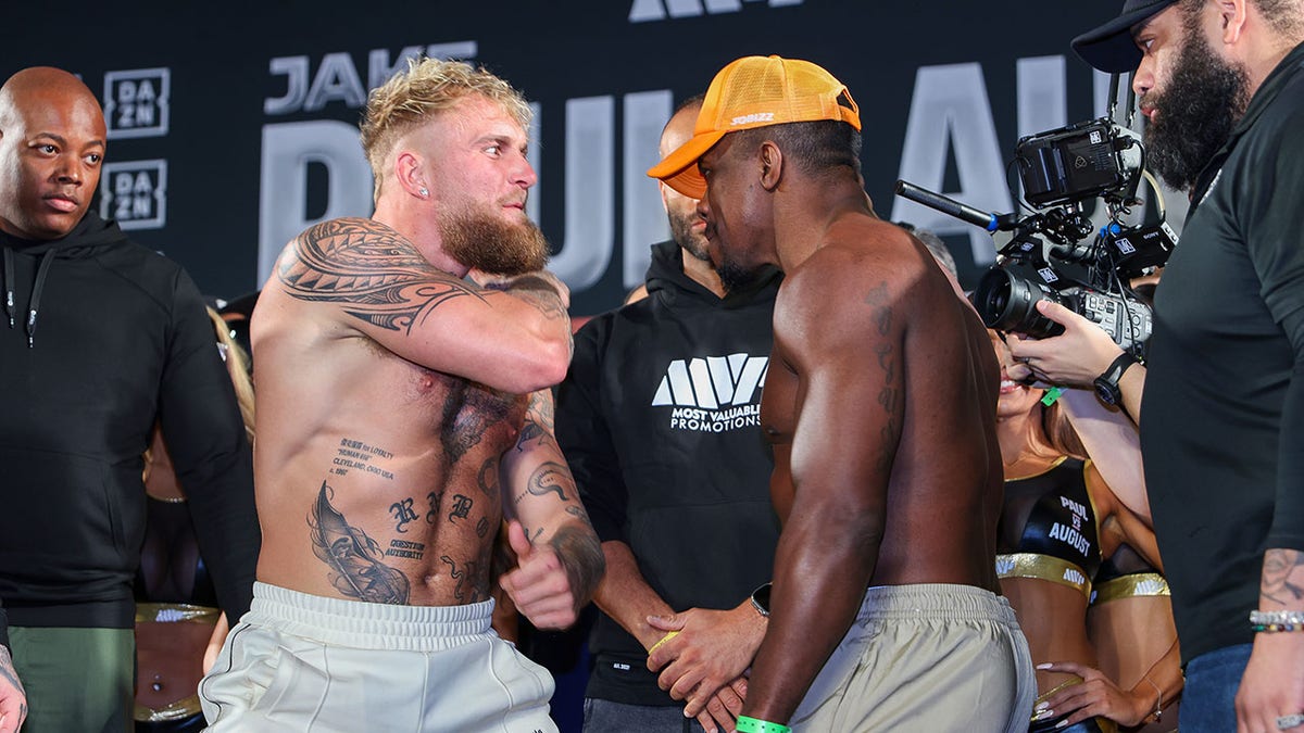 Jake Paul and Andre August at weigh in
