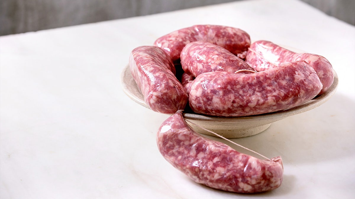 Raw uncooked italian sausages 