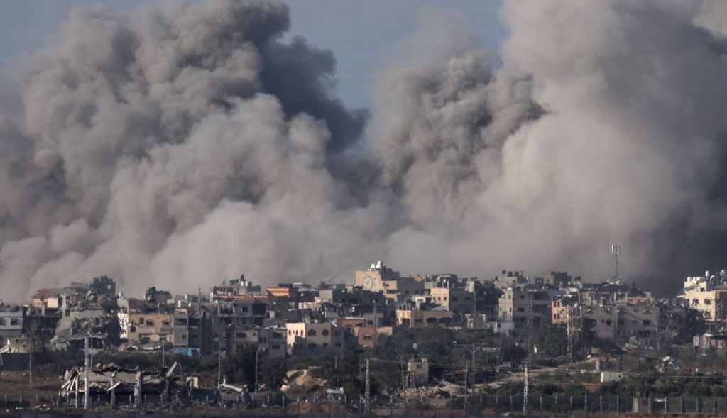 Smoke rises following an Isareli airstrike on Gaza's al-Shuja'ia district as seen from Nahal Oz, Israel, 09 December 2023. 