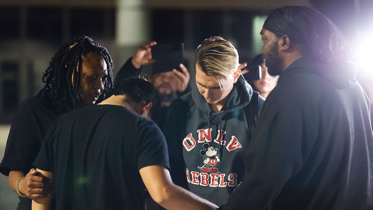 University of Nevada, Las Vegas, students pray after shooting on campus