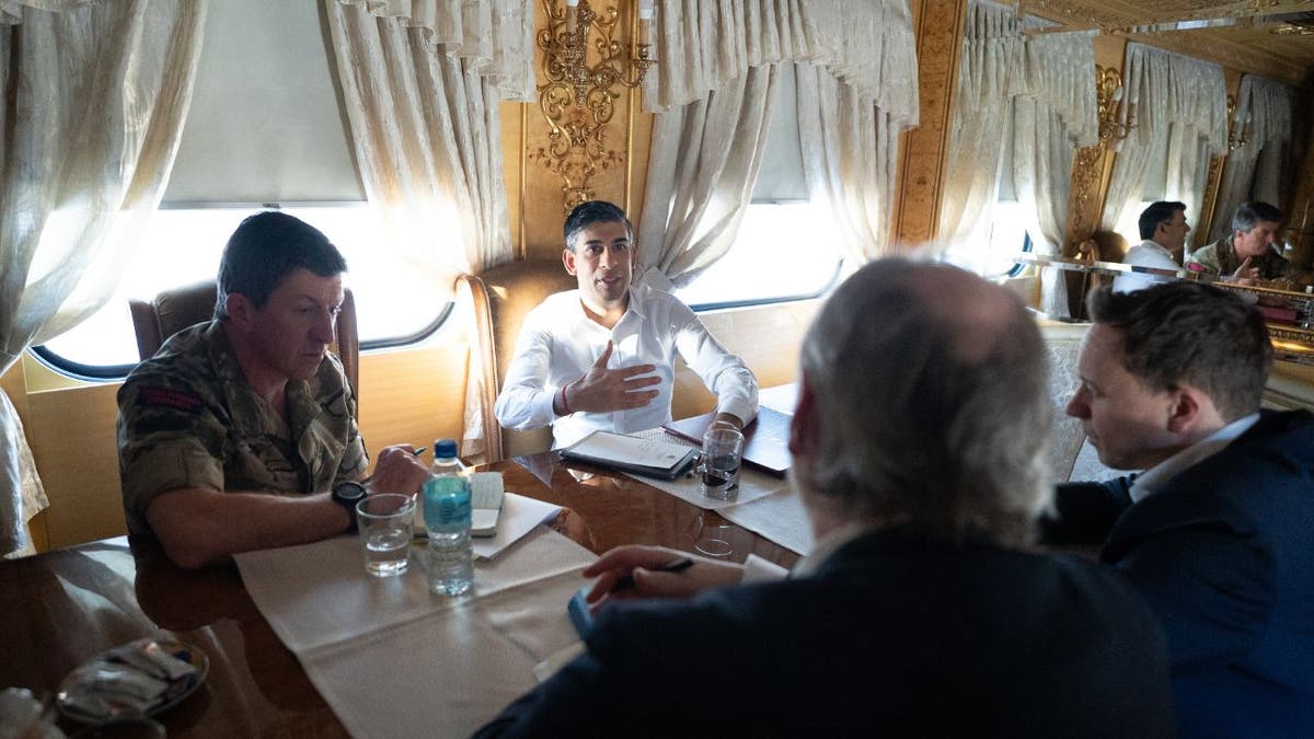 U.K Prime Minister Rishi Sunak on a train with Ukraine military personnel