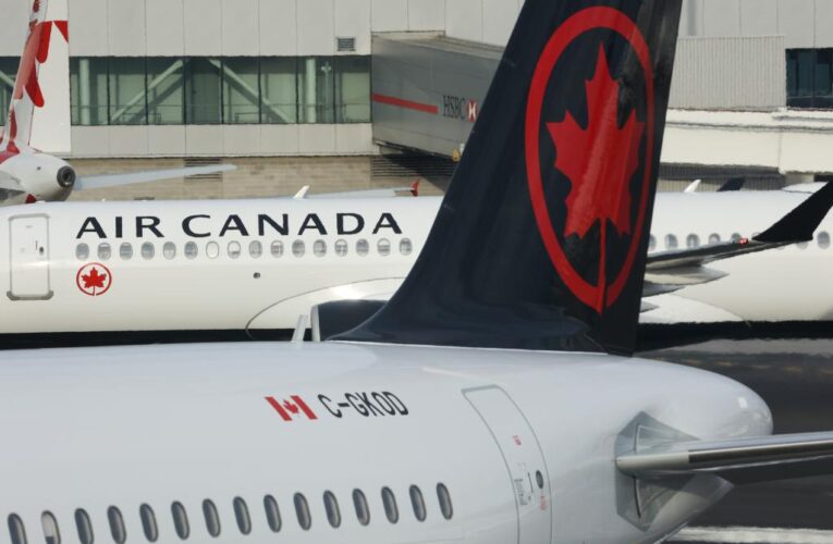 Air Canada passenger tries to open door during flight