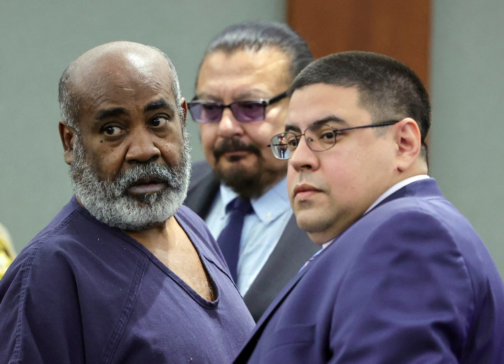 Duane "Keffe D" Davis, left, with deputy special public defenders Robert Arroyo, right, and Charles Cano, rear, appears for his arraignment at the Regional Justice Center, Nov. 2, 2023, in Las Vegas.