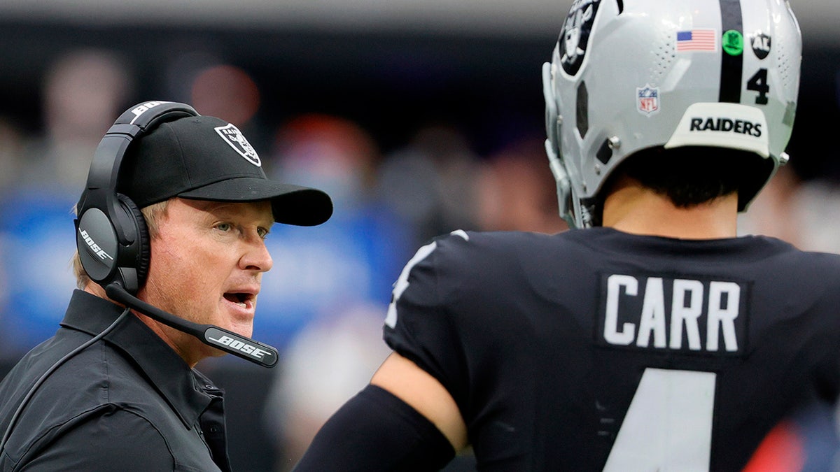 Jon Gruden and Derek Carr