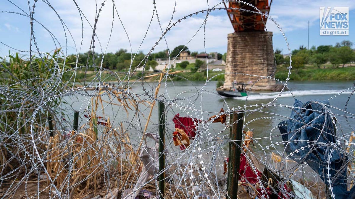 Migrants cross the Rio Grande River to enter the American Border