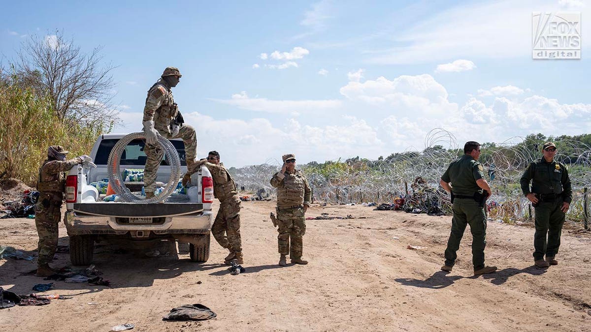 Migrants cross the Rio Grande River to enter the American Border