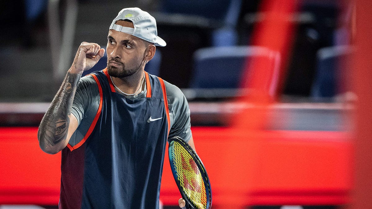 Nick Kyrgios celebrates a point during a match at the Japan Open