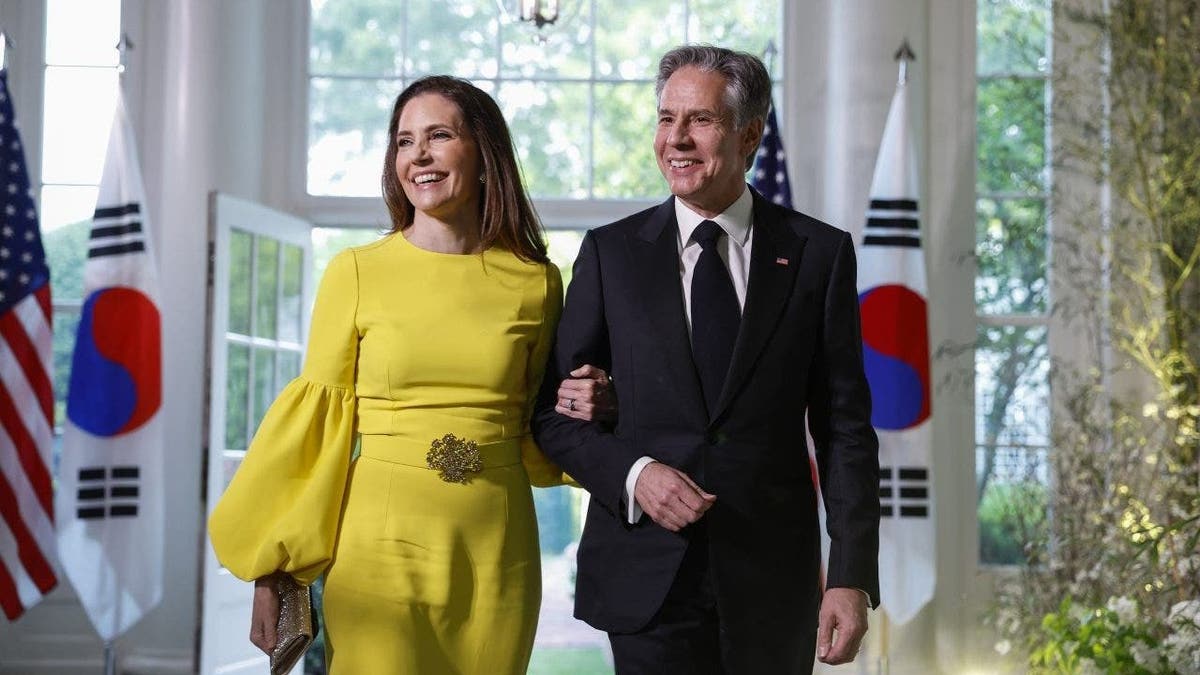 U.S. Secretary of State Antony Blinken and his wife Evan Ryan