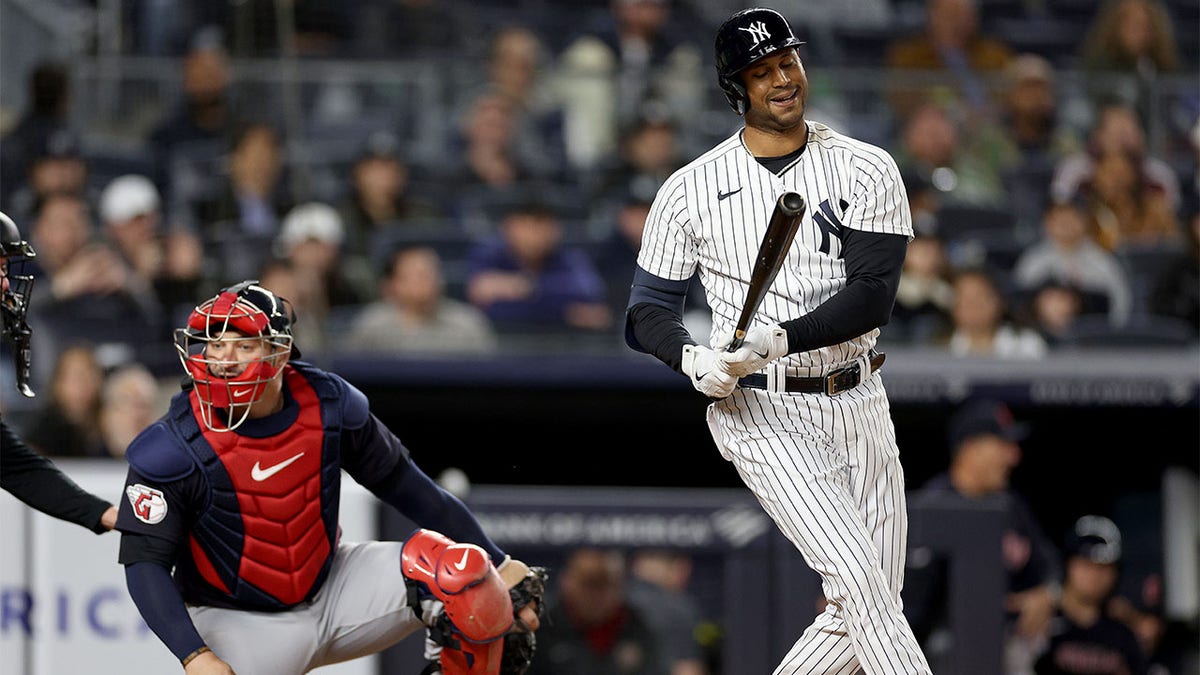 Aaron Hicks reacts after striking out