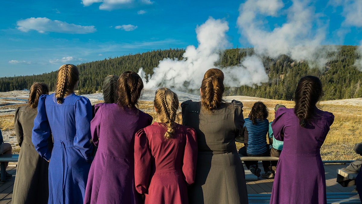 Members of FLDS with their backs